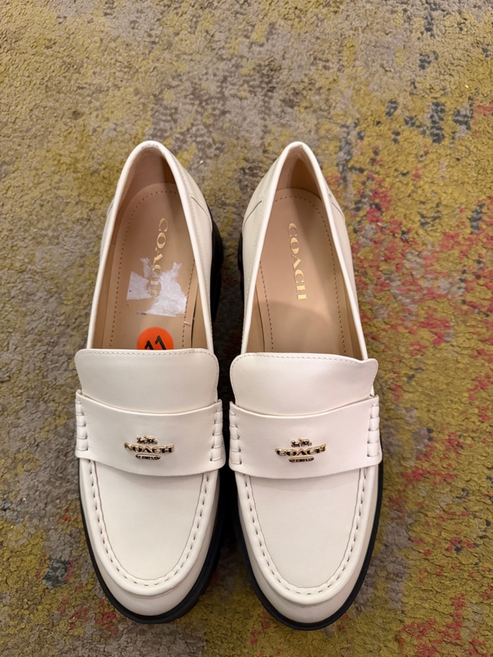 COACH off White Leather Penny Loafers with Gold Logo